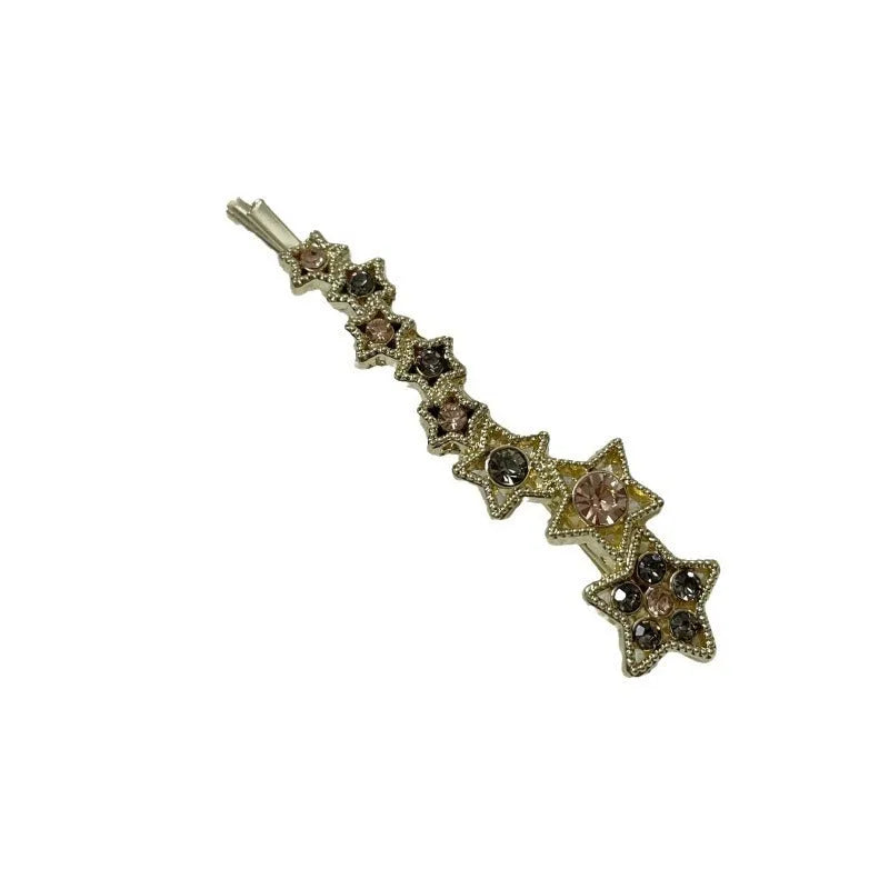 Gold rhinestone barrette with star design for clipping bangs and side hair