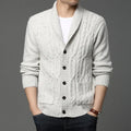 Men's knitted cardigan in jacquard pattern, shown in a neutral colour with a straight cut and open front.