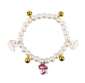 Adjustable simulated pearl necklace cat collar with a Halloween pumpkin charm in purple ghost, skull, or smile designs.