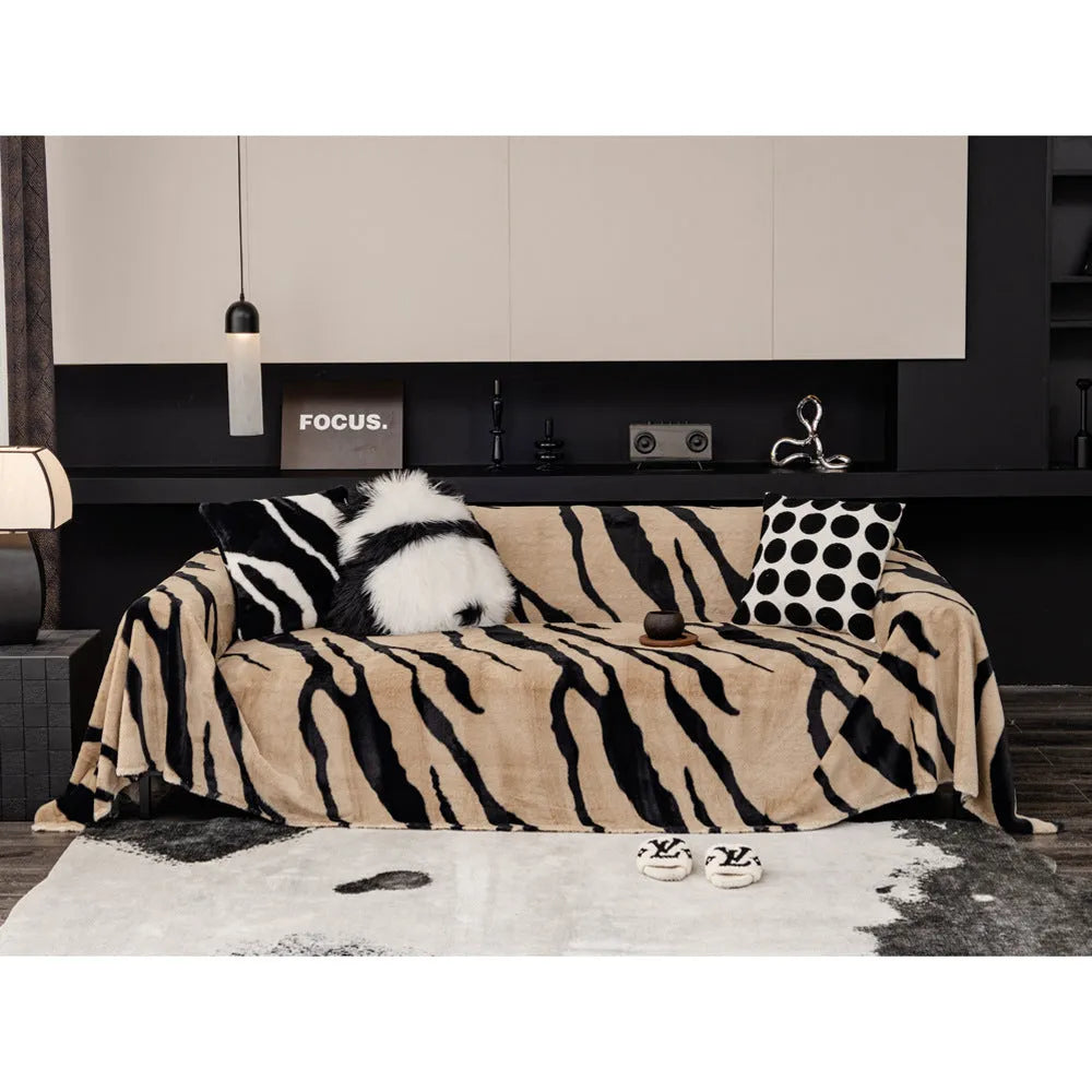 Zebra pattern non-slip flannel sofa cover with matching pillowcase in caramel colour.