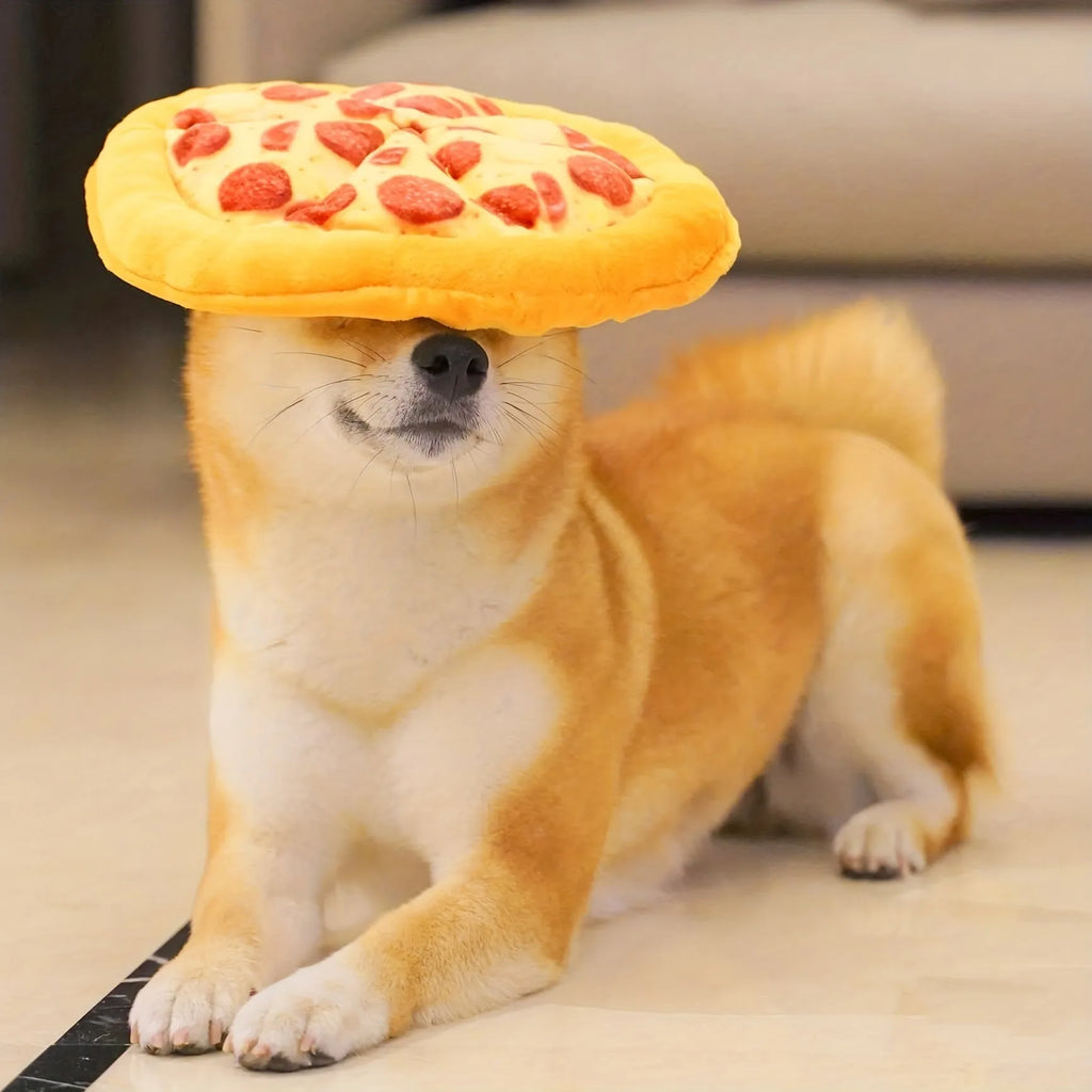 Yellow pizza-shaped squeaky dog toy for teeth grinding and chewing
