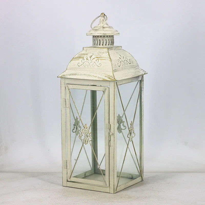 European black and white wrought iron floor-standing storm lantern with tempered glass in three sizes for courtyard decoration.