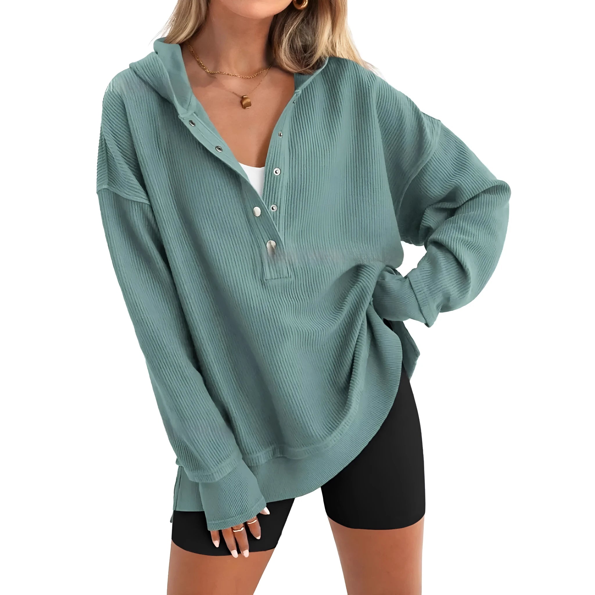 Women's loose raglan sleeve pullover sweater in peacock green colour, laid flat.