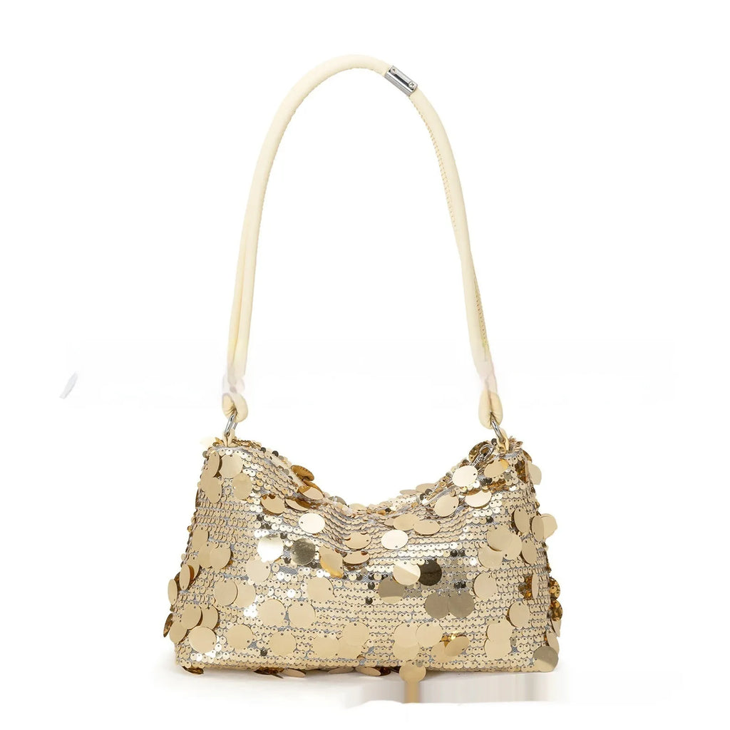 Gold soft polyester underarm crossbody shoulder bag showing sandwich pocket design and single strap.