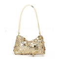 Gold soft polyester underarm crossbody shoulder bag showing sandwich pocket design and single strap.