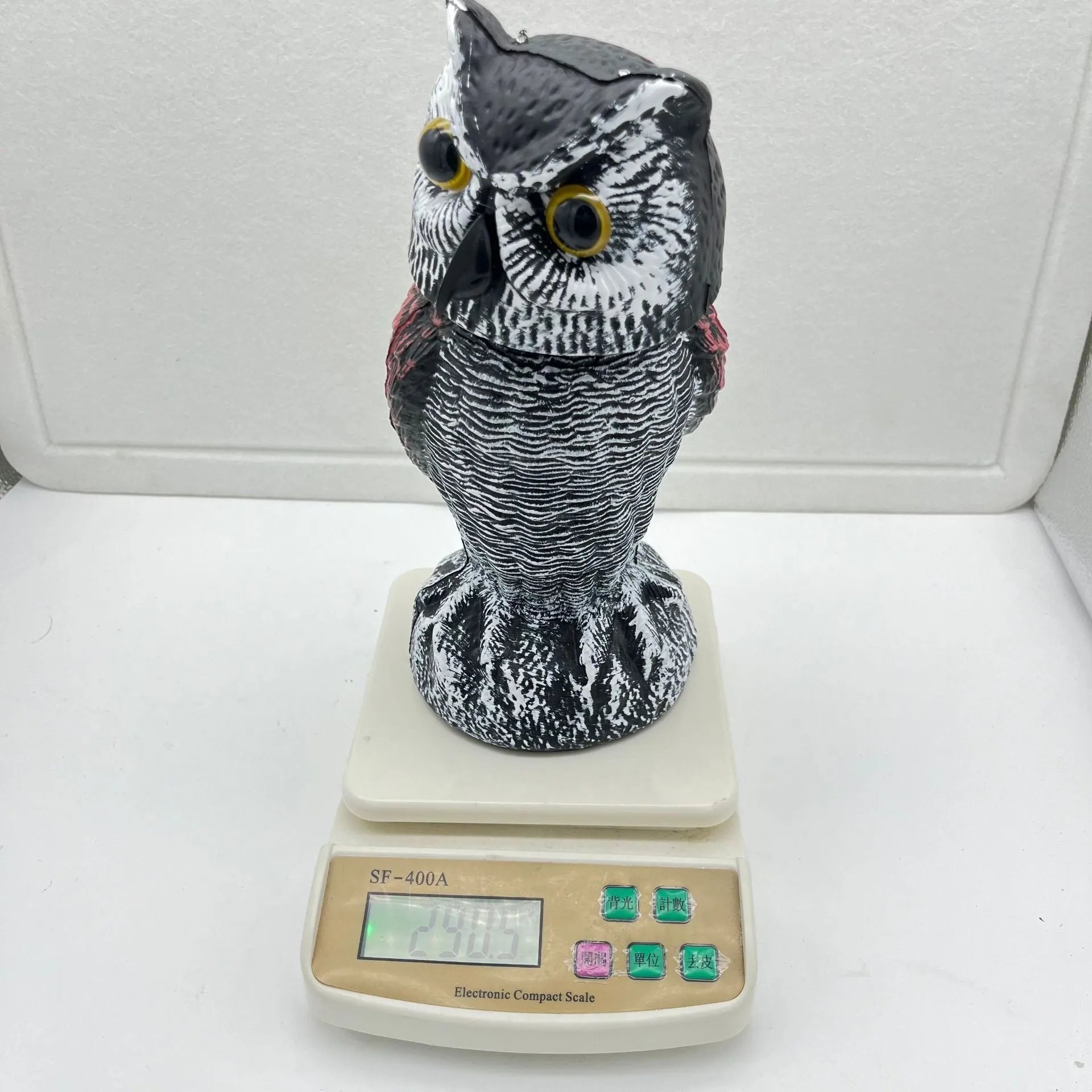 Artificial owl bird scarer ornament with motion features for outdoor garden pest control