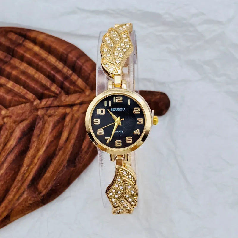 Women's stainless steel watch with round dial on a metal strap with Vachette clasp.