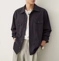 Men's light sand rice coloured long sleeve shirt with a lapel collar, laid flat to show front design.