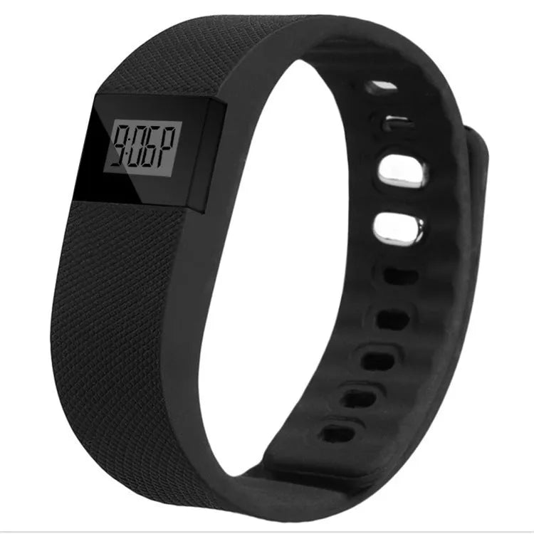 Bracelet pedometer with black plastic and ABS band showing display tracking steps, distance, calories and time