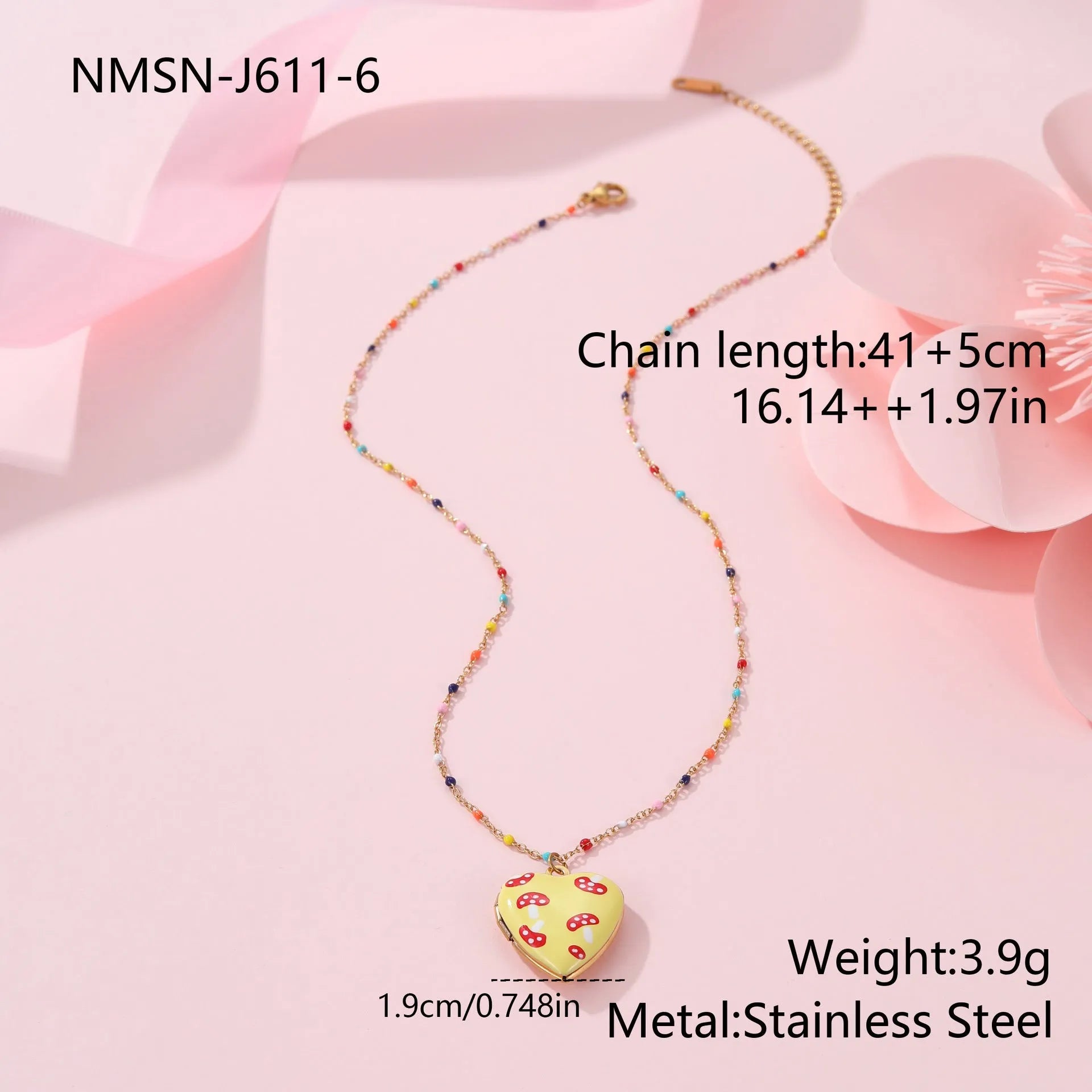 Women's stainless steel necklace with 18K gold plating showing heart pendant with fruit designs
