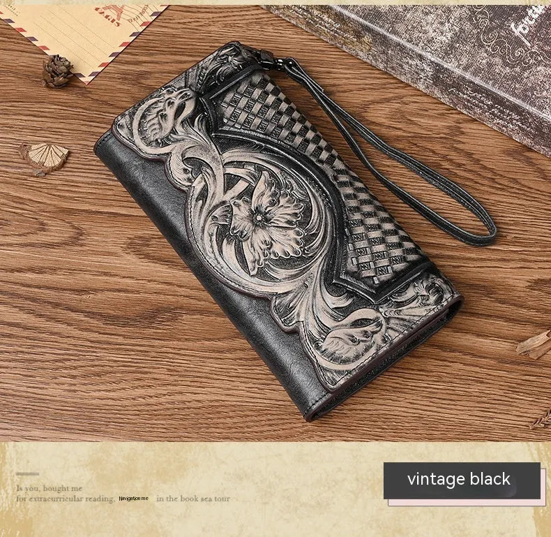 Women's brown genuine leather tri-fold wallet with embossed floral pattern showing open compartments