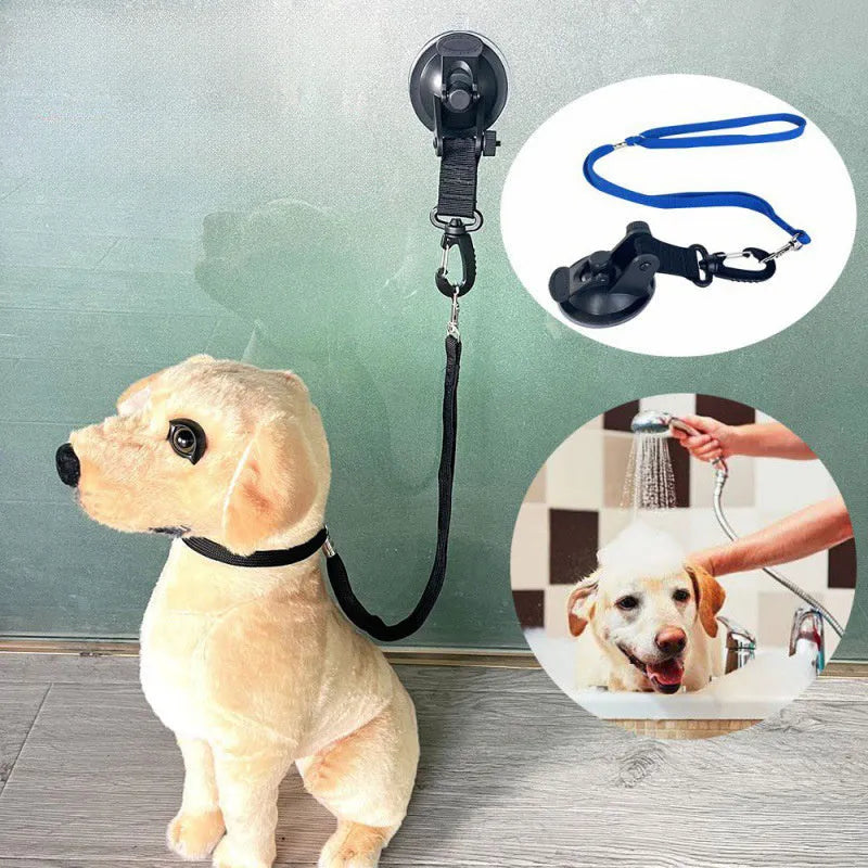 Black and blue pet bathing restraint with four adjustable suction cup cuffs for dogs.