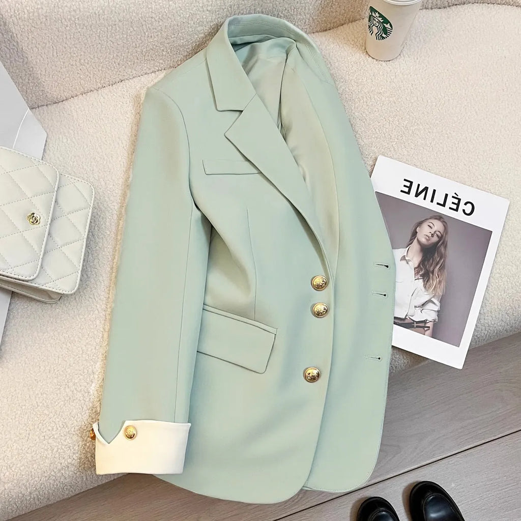 Women's loose mid-length coat in Korean style with long sleeves and pocket details