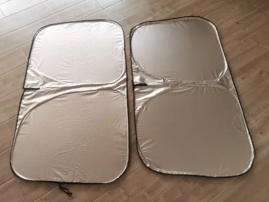 Aluminium foil car windscreen sunshade in titanium silver, shown folded and unfolded.