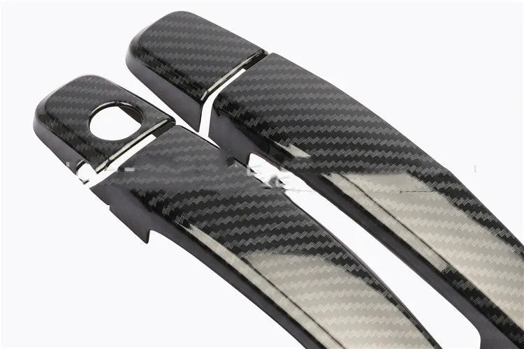 Carbon fibre pattern door handle overlay for Opel Vauxhall Astra car interior