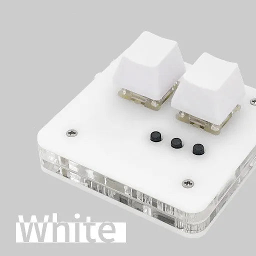 Compact white plastic USB keyboard with a touch panel and multimedia keys.