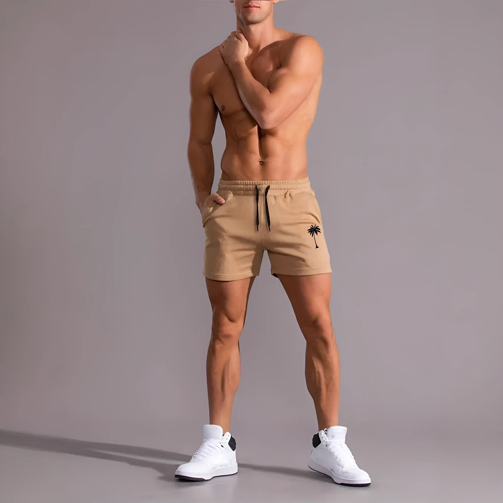 Men's khaki coconut printed sports shorts with elastic waistband and straight leg design