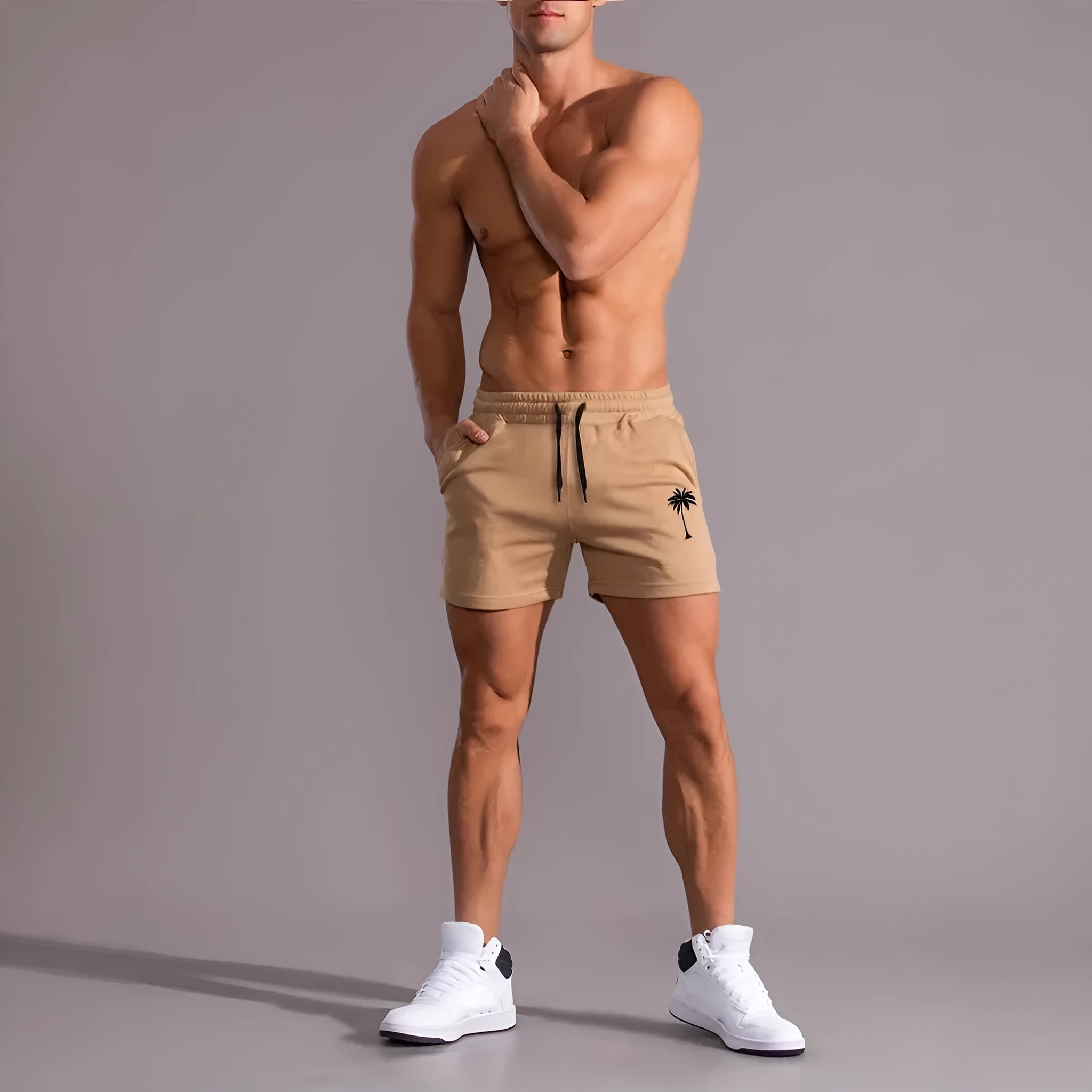 Men's khaki coconut printed sports shorts with elastic waistband and straight leg design