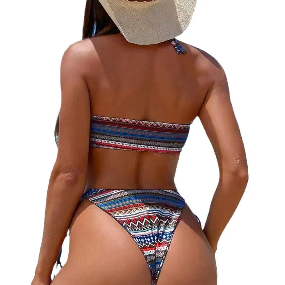 Women's halter-neck split bikini swimsuit in polyester fabric available in multiple colours