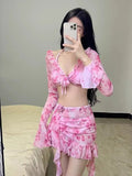 Women's floral bikini swimsuit set in cherry blossom pink colour.