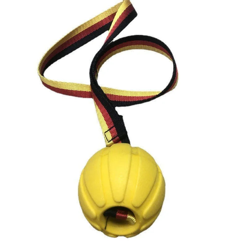 Floating camouflage and yellow EVA pet training ball with knotted tether in three diameter sizes for water retrieval