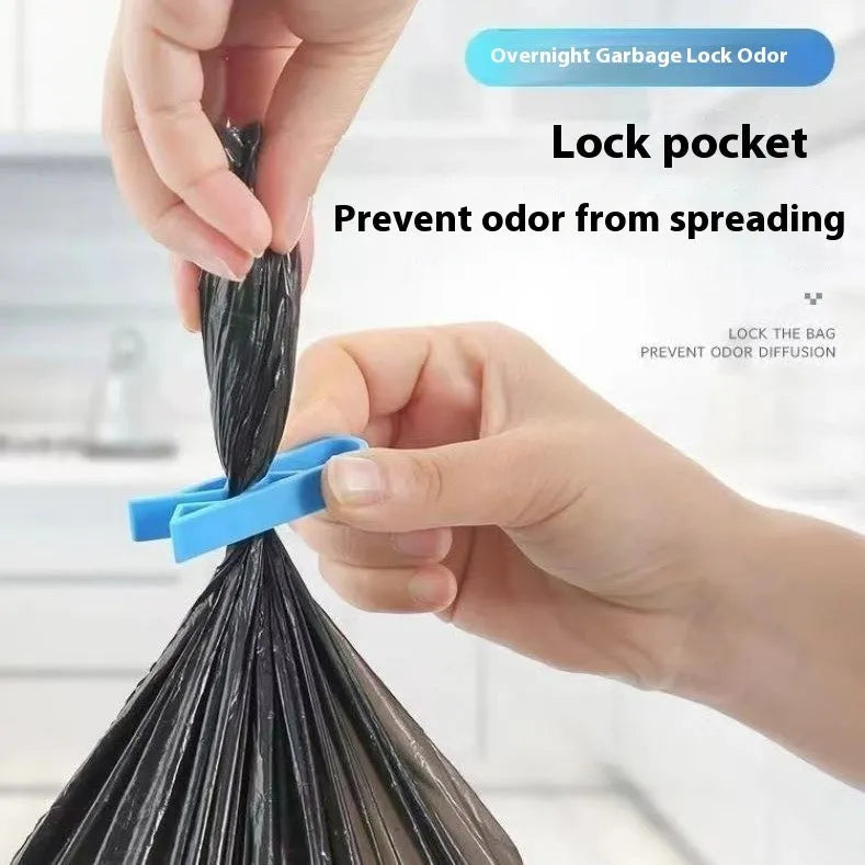 PP plastic non-slip clip for fixing a bin bag to the side of a rubbish can.