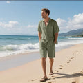 Man's light blue linen blend short-sleeve shirt and matching shorts casual beach set.