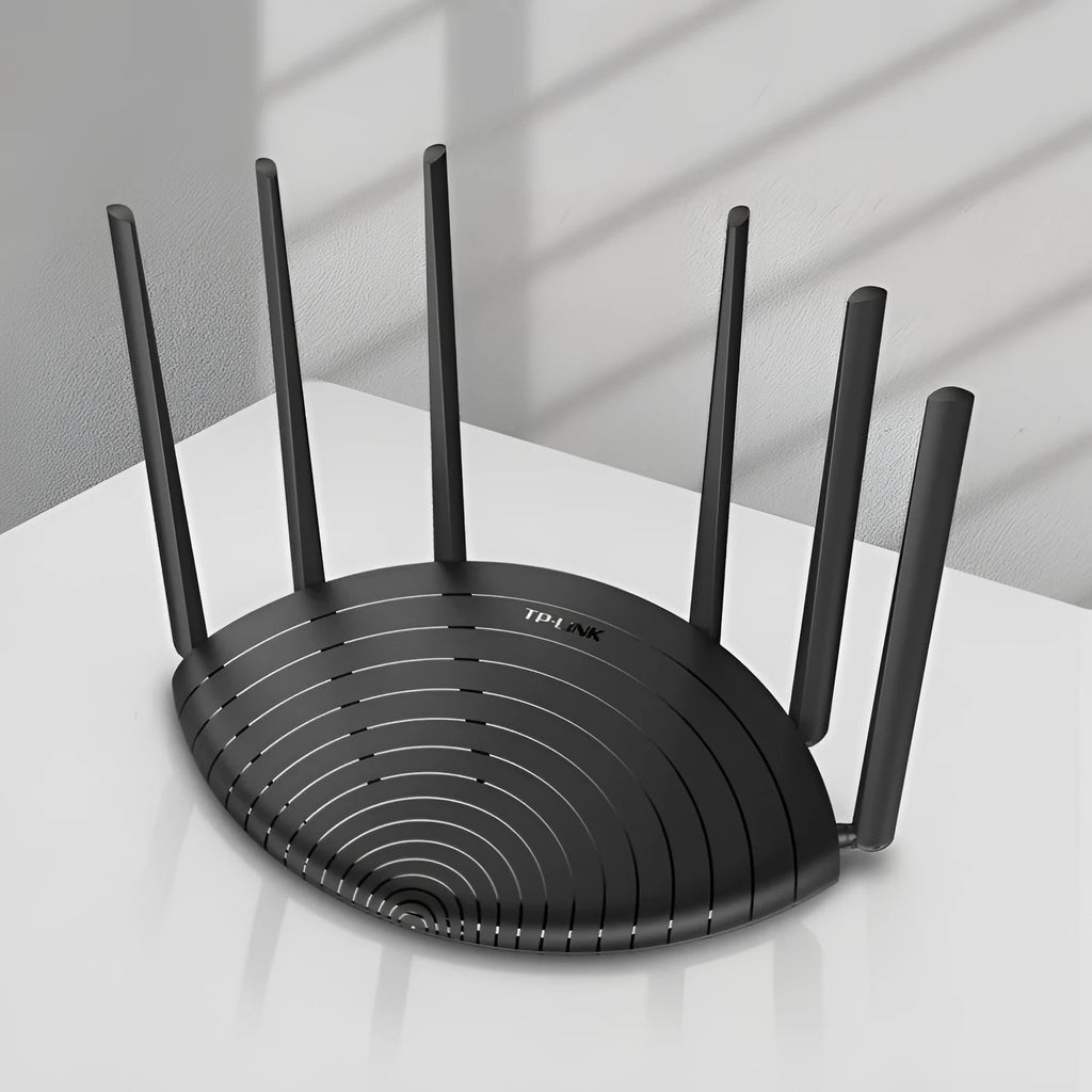 TL-WDR7661 AC1900 Gigabit wireless router with non-detachable antennas on a desk