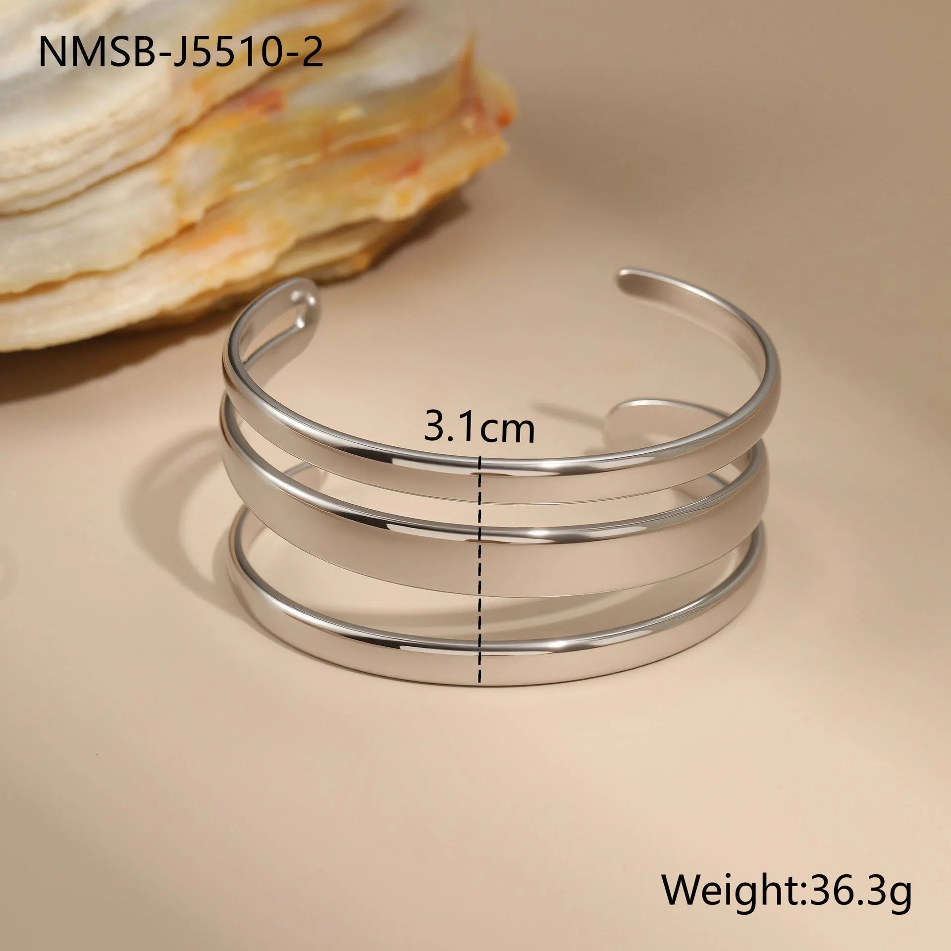 Stainless steel geometric opening bracelet with 18K electroplating in gold or steel colour