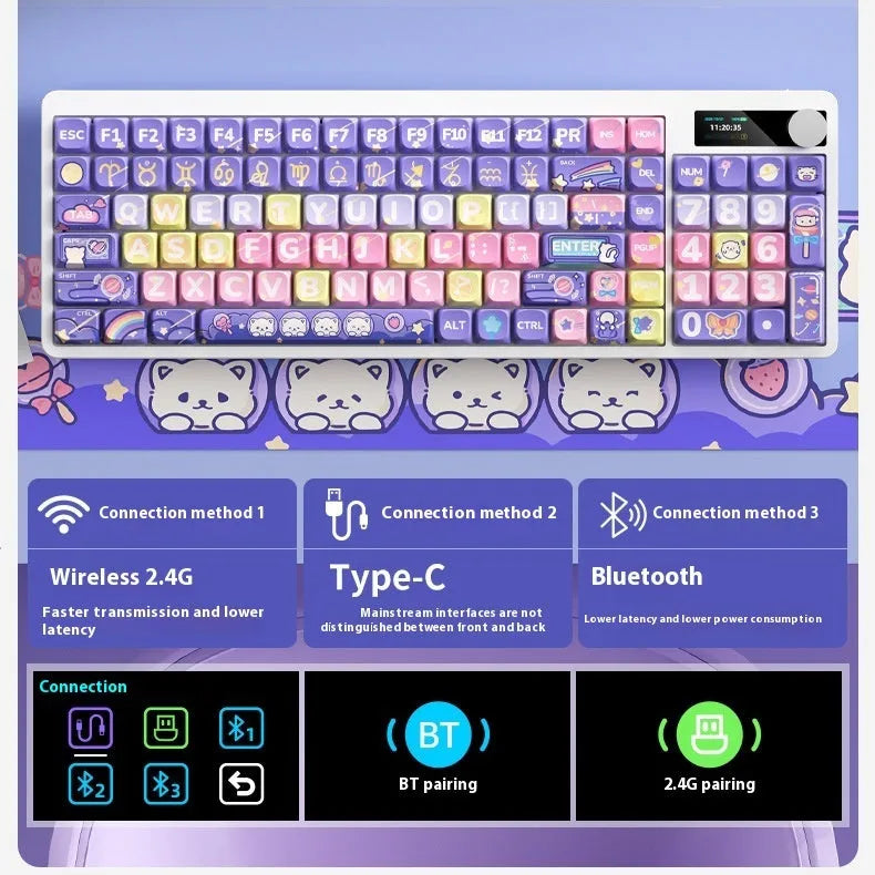Black Iron Cow themed mechanical keyboard with RGB backlighting on a desk next to a laptop.