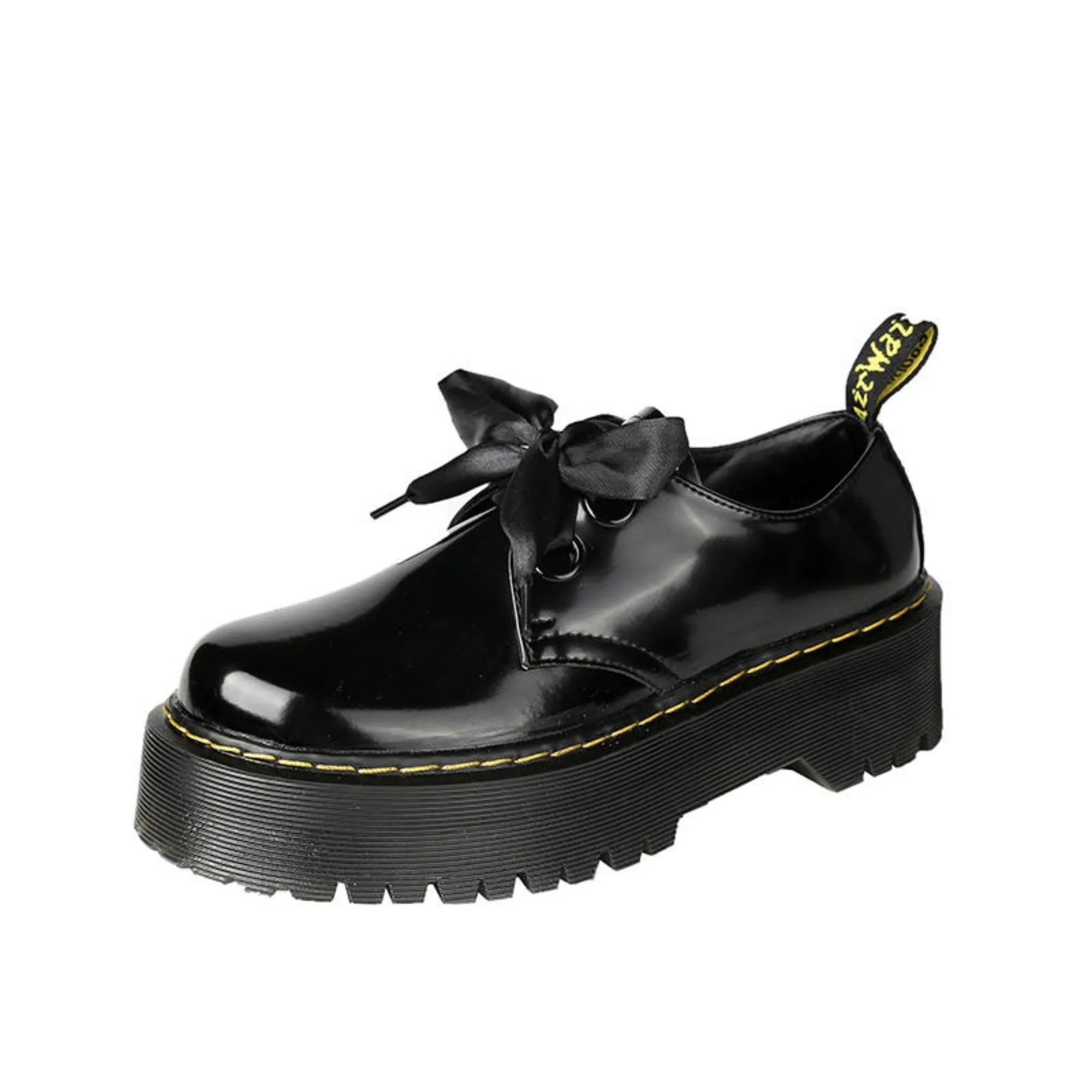 Women's black and white thick-soled leather shoes with lace-up closure and decorative straps