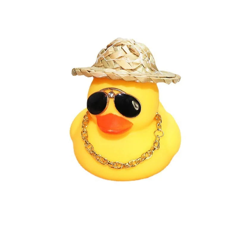 Yellow duck cartoon character wearing straw hat car dashboard ornament with sunglasses and necklace accessories