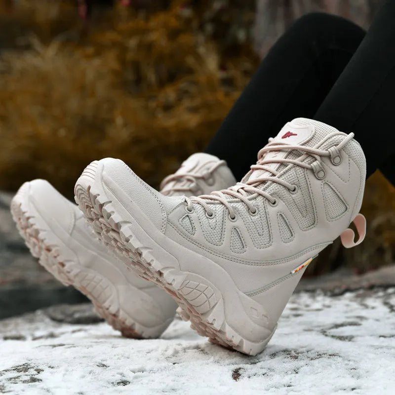 Beige cowhide leather hi-top hiking sneakers on a neutral background