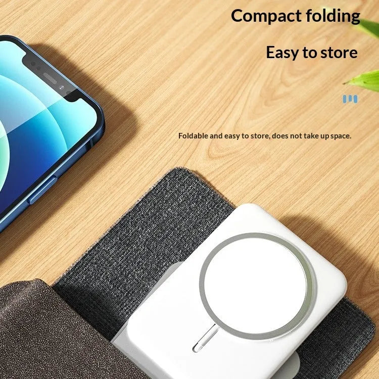 Silver aluminium alloy wireless charging stand holding a phone upright on a desk