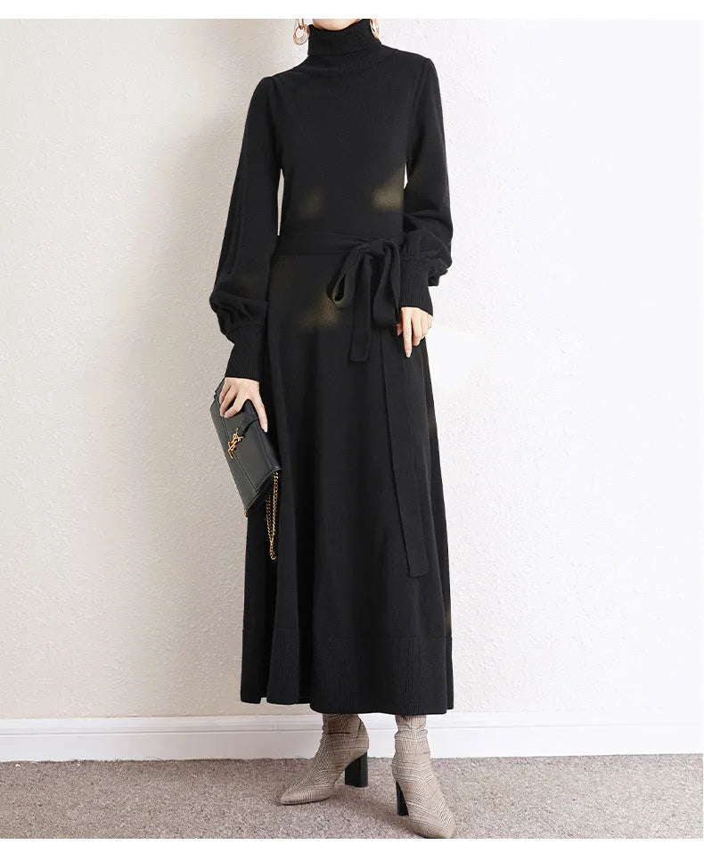 Women's turtleneck long sleeve knit dress in loose fit with big hem and elastic waist.