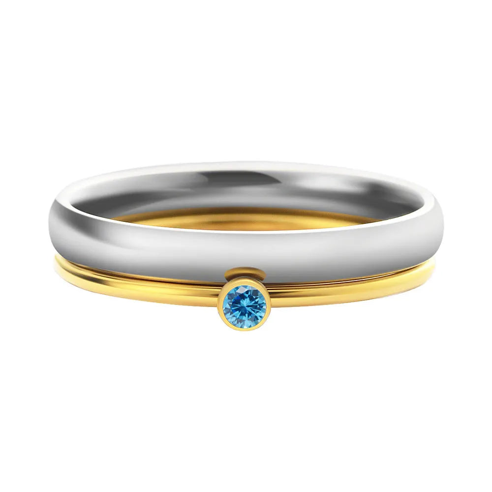 December colour birthstone engraved ring in titanium steel with a geometric design.