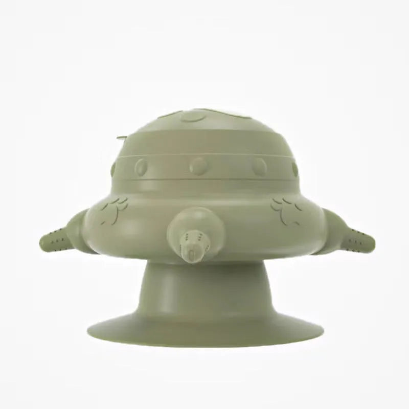 Pink silicone pet nursing milk bowl with four attached pacifiers on a flat base.