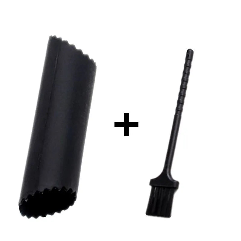Two-in-one aluminium alloy garlic press with silicone peeler cleaning brush on a kitchen surface