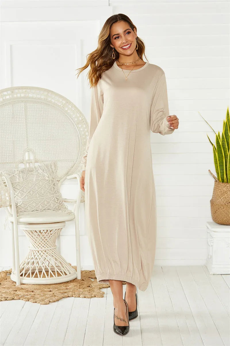 Women's black lantern dress with lace-up crew neck and loose silhouette
