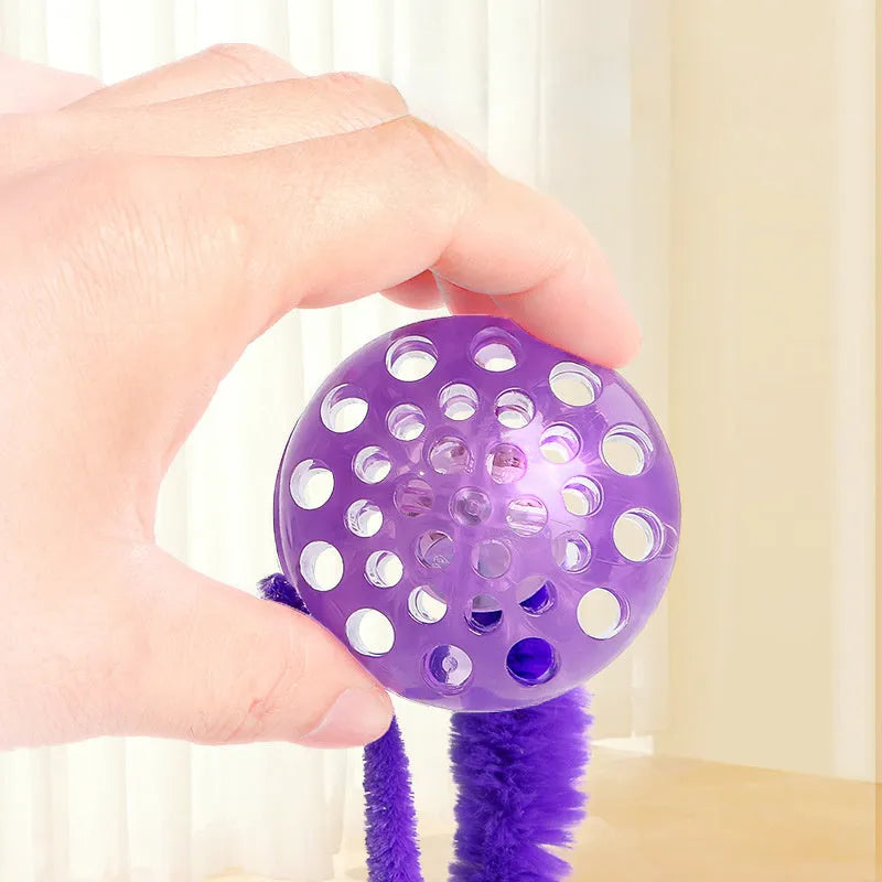 Interactive cat ball toy with TPR bouncy ball and plush tail in green colour