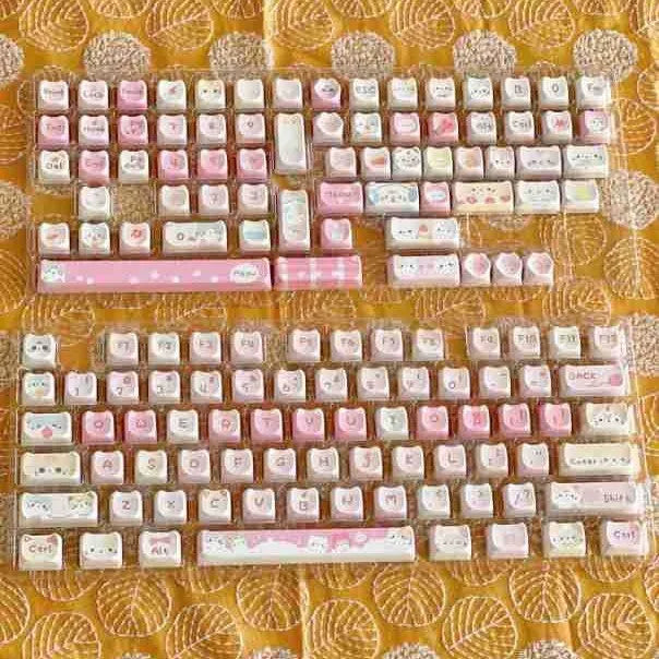Meow Meow Team tall five-sided dye-sublimation 141-piece mechanical keyboard keycap set laid out.