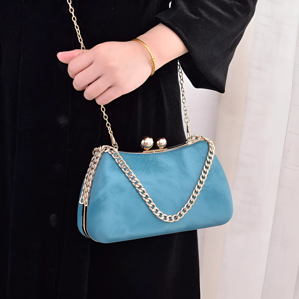 Embossed PU leather pillow chain shoulder bag in silver with lock closure