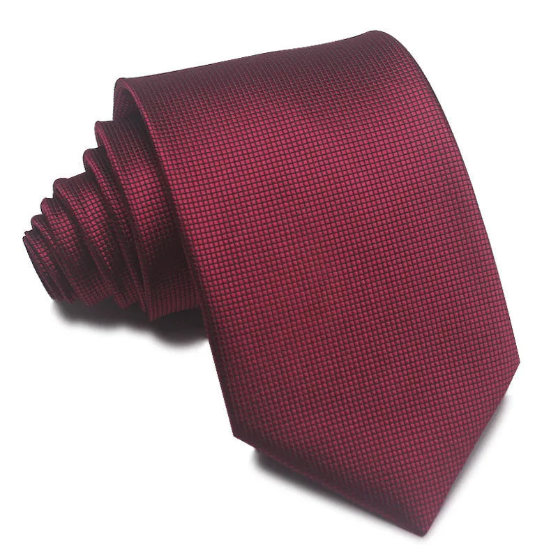 Men's red and black striped polyester jacquard tie with an arrow shape laid flat