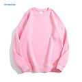 Women's loose fit cotton off shoulder sweater in a solid colour on a hanger.