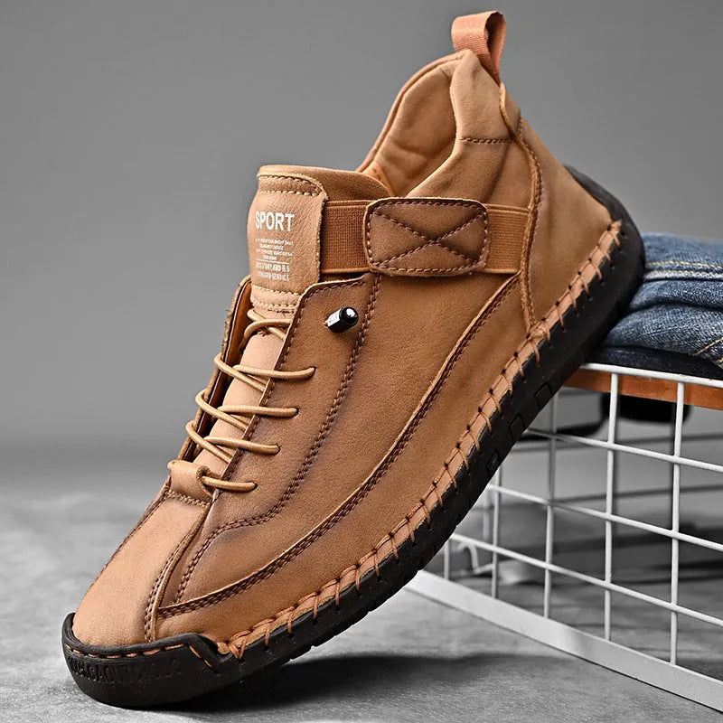 Men's mid-top Martin boot in khaki colour with tooling stitching on the rubber sole.