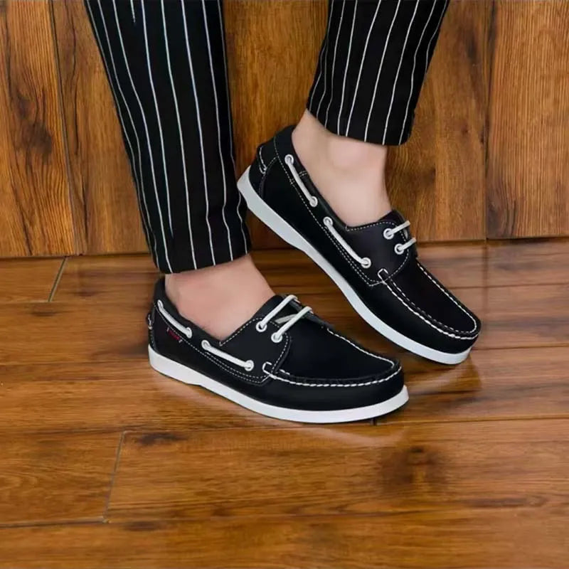 Men's solid colour casual shoes with round toe and flat heel on a white background.