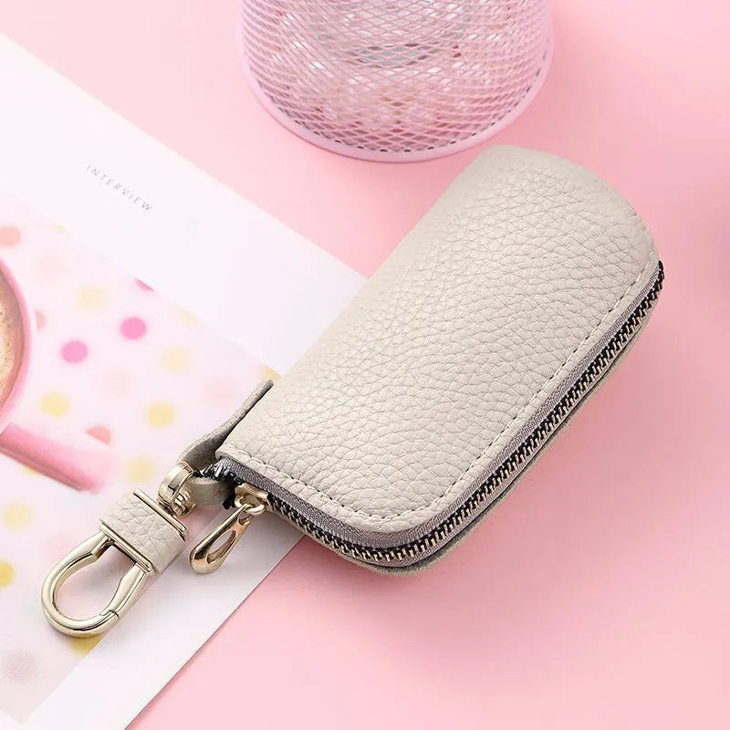 Black PU leather zipper key case showing expansion storage capacity