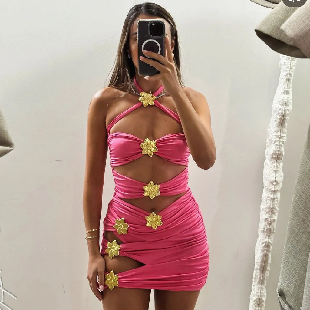 A solid colour one-piece swimsuit for women with a hollow-out tube top and a matching short skirt.