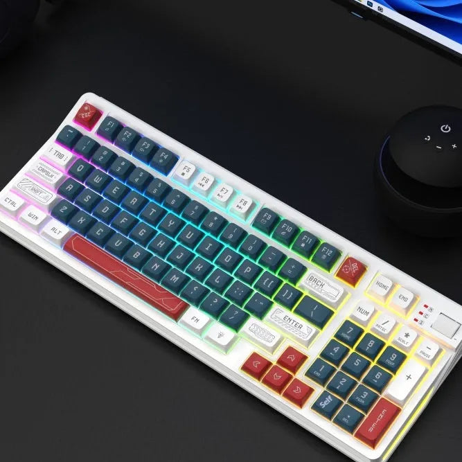 USB desktop keyboard with luminous backlit keys in a black and green colour combination.