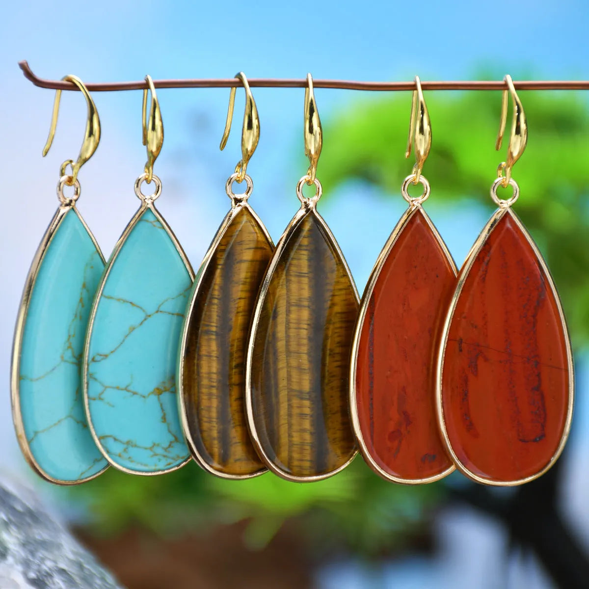 Vintage long drop earrings made of stone in Tigereye, Amethyst, Pink Crystal, Redstone, or Turquoise.